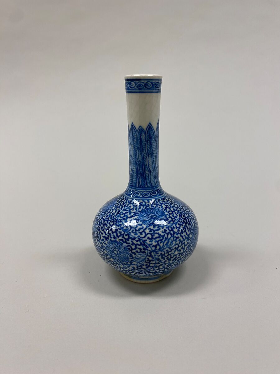 Bottle vase with floral scrolls, Soft-paste porcelain painted in underglaze cobalt blue (Jingdezhen ware), China 