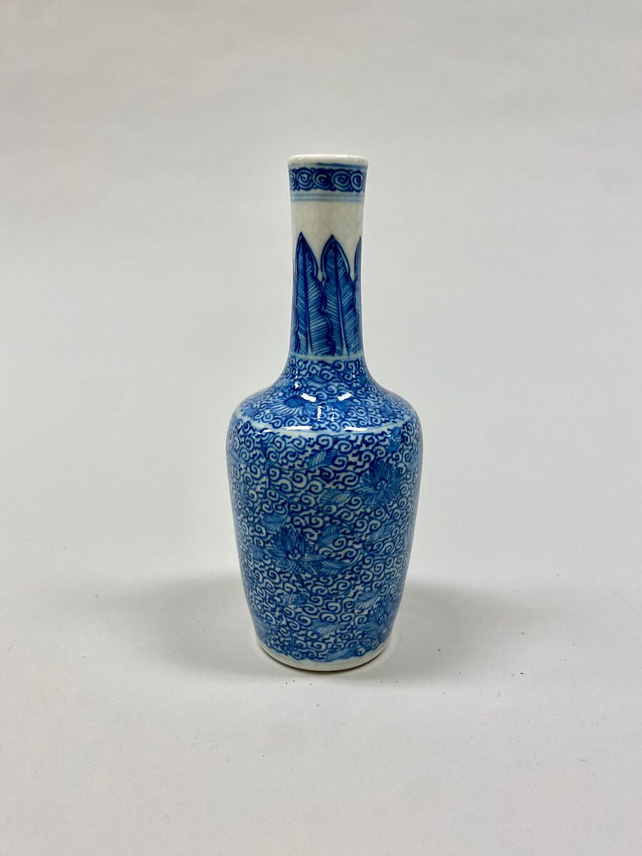 Bottle vase with floral scrolls, Soft-paste porcelain painted in underglaze cobalt blue (Jingdezhen ware), China 