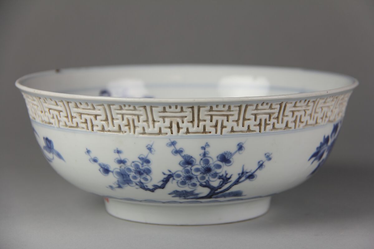 Bowl with immortals and flowers, Porcelain painted in underglaze cobalt blue, and with relief decoration (Jingdezhen ware), China