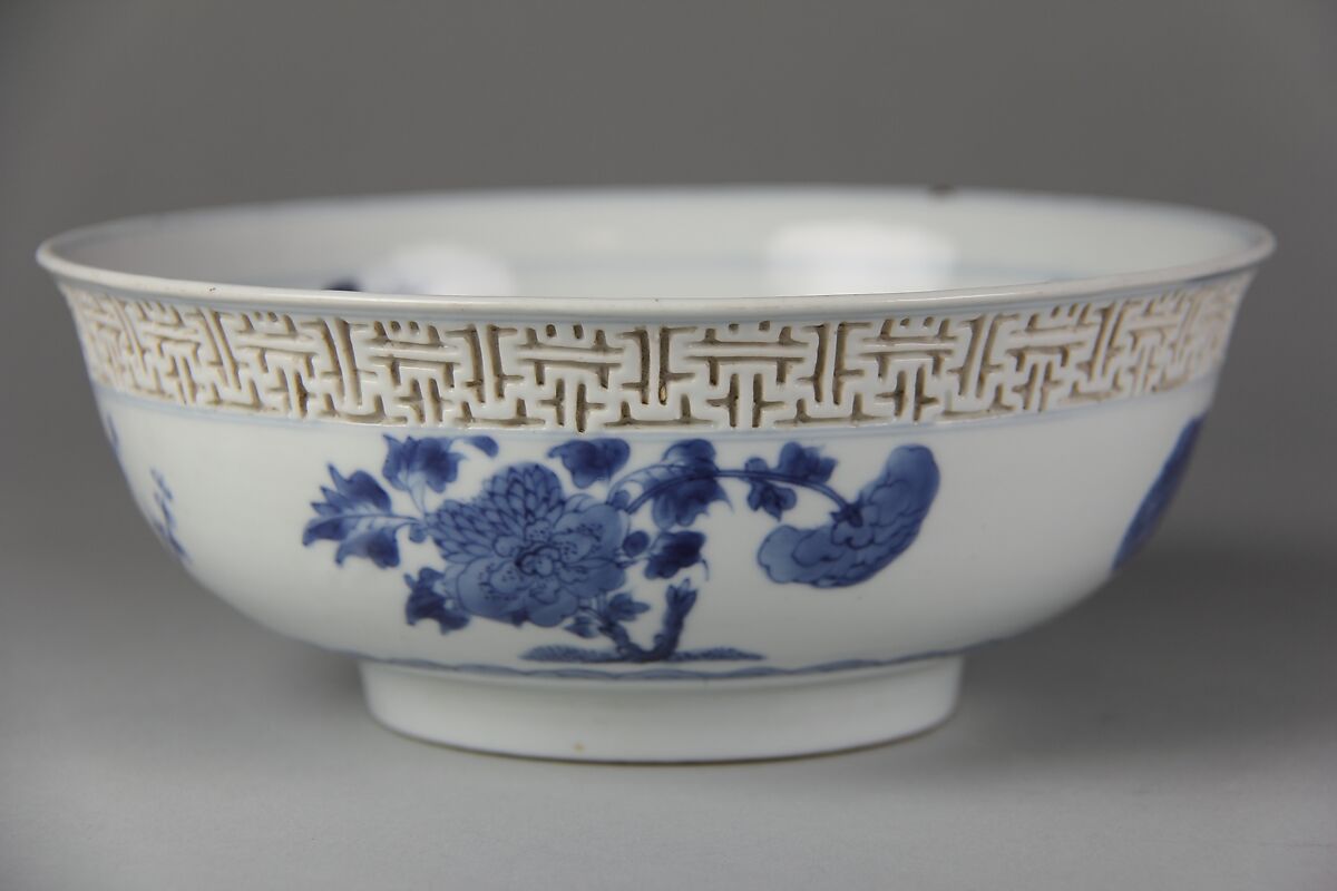 Bowl with immortals and flowers, Porcelain painted in underglaze cobalt blue, and with relief decoration (Jingdezhen ware), China