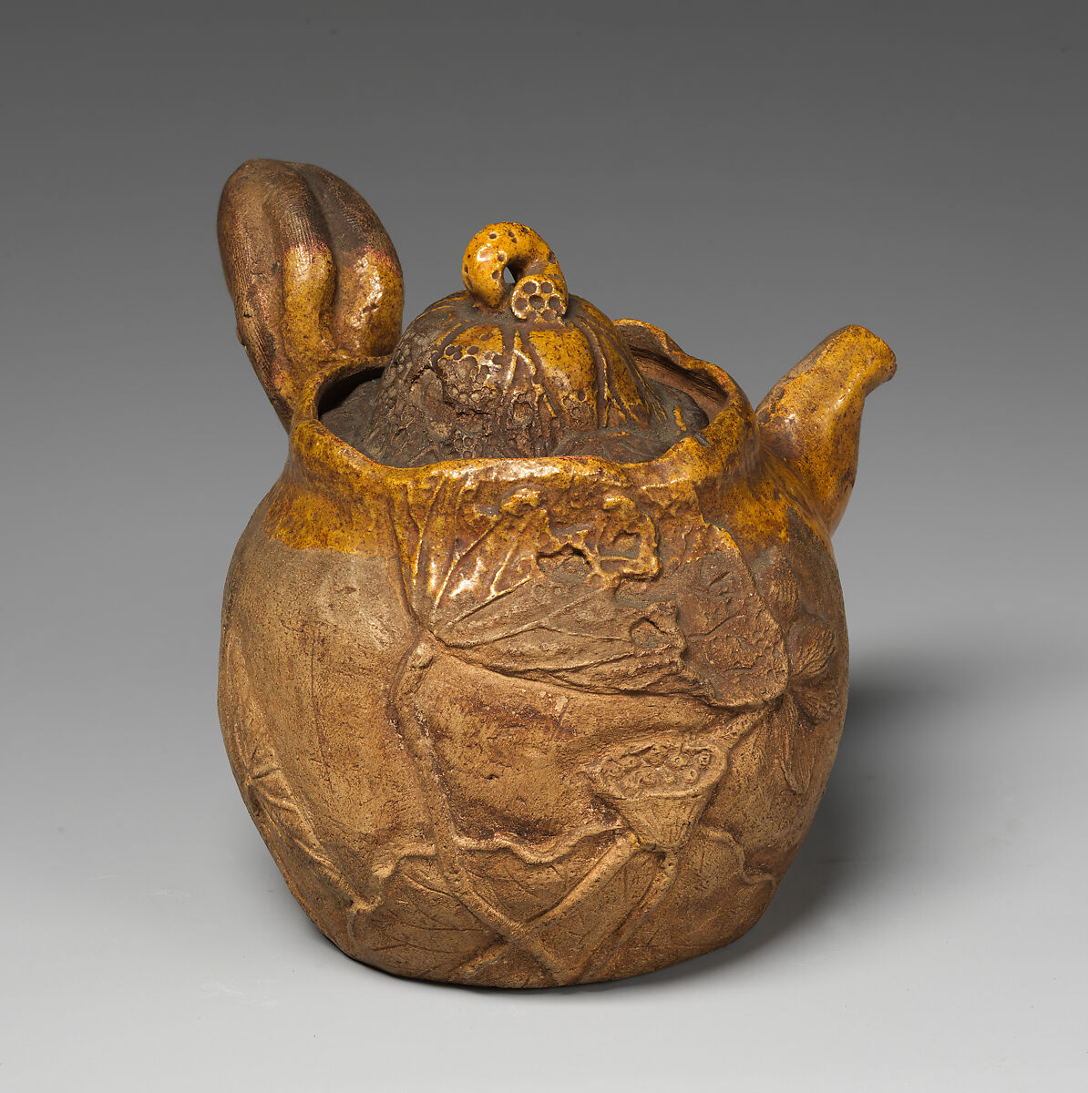 Teapot, Pottery moulded, partly covered with glaze, Japan 