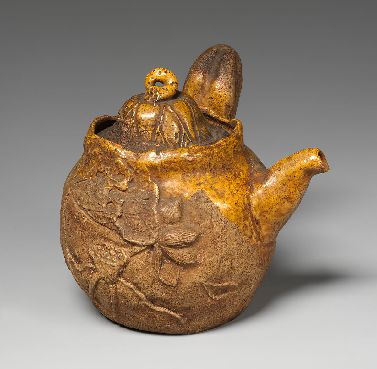 Teapot, Pottery moulded, partly covered with glaze, Japan