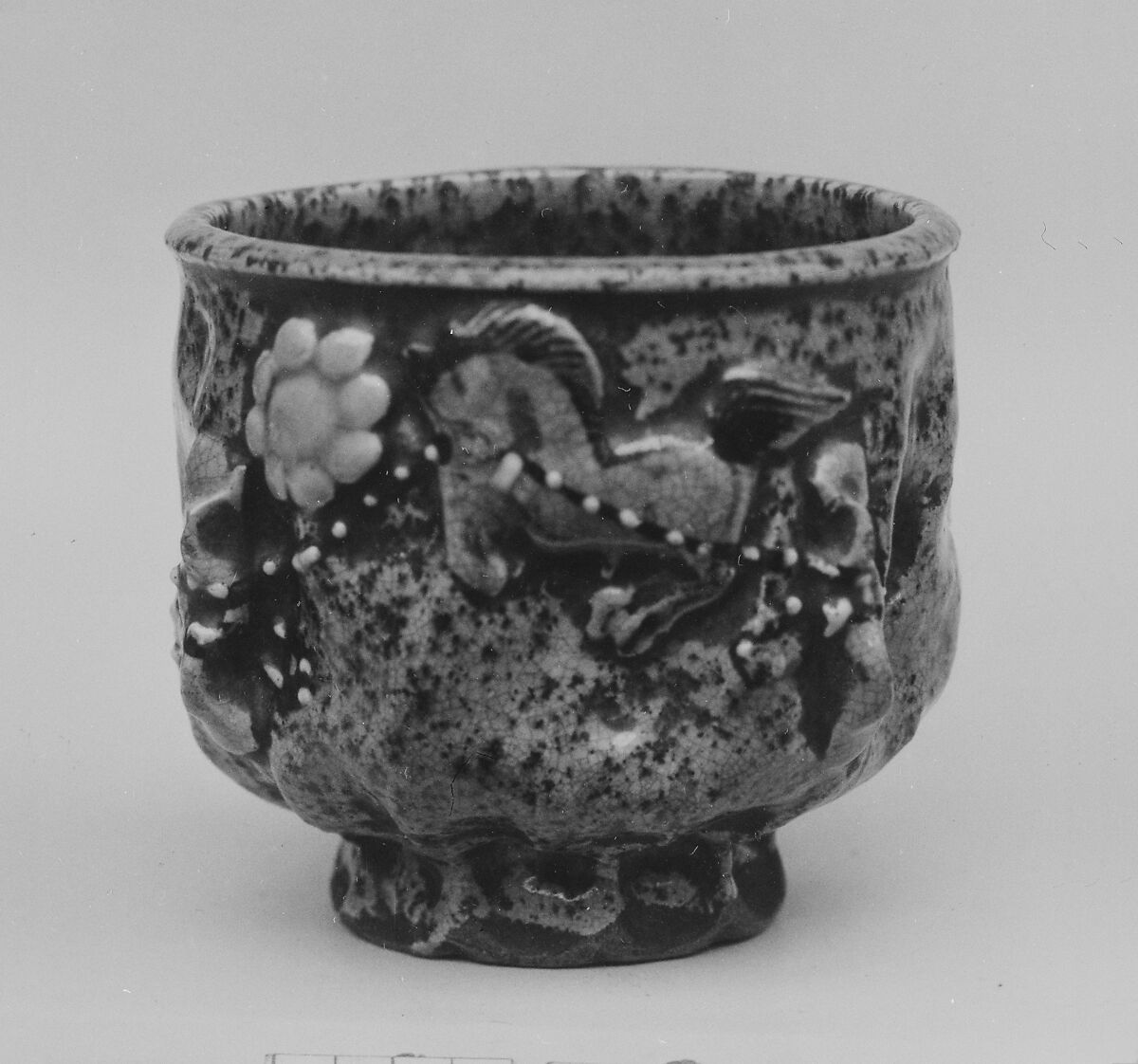 Cup, Pottery covered with glaze having dark brown speckles; decoration in high relief (Soma ware), Japan 