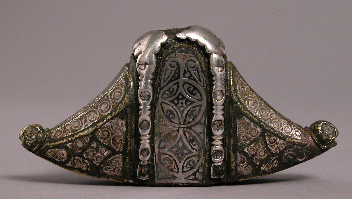 Sword Pommel, Copper alloy inlaid with silver wire and niello on
an iron core, Anglo-Saxon