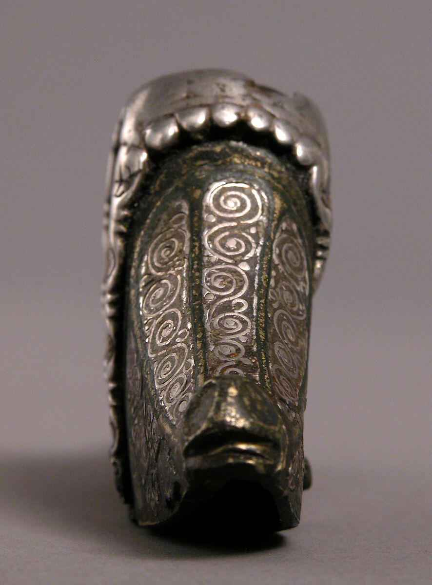 Sword Pommel, Copper alloy inlaid with silver wire and niello on
an iron core, Anglo-Saxon