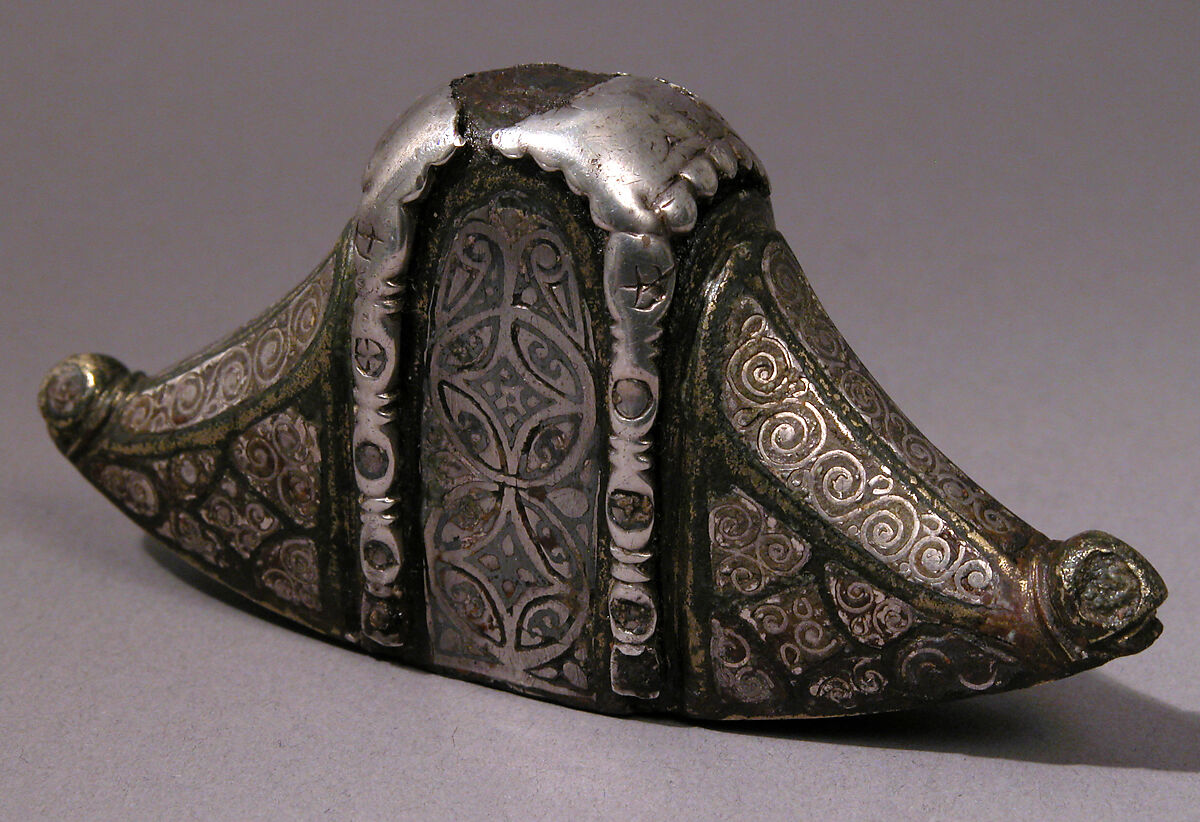 Sword Pommel, Copper alloy inlaid with silver wire and niello on
an iron core, Anglo-Saxon