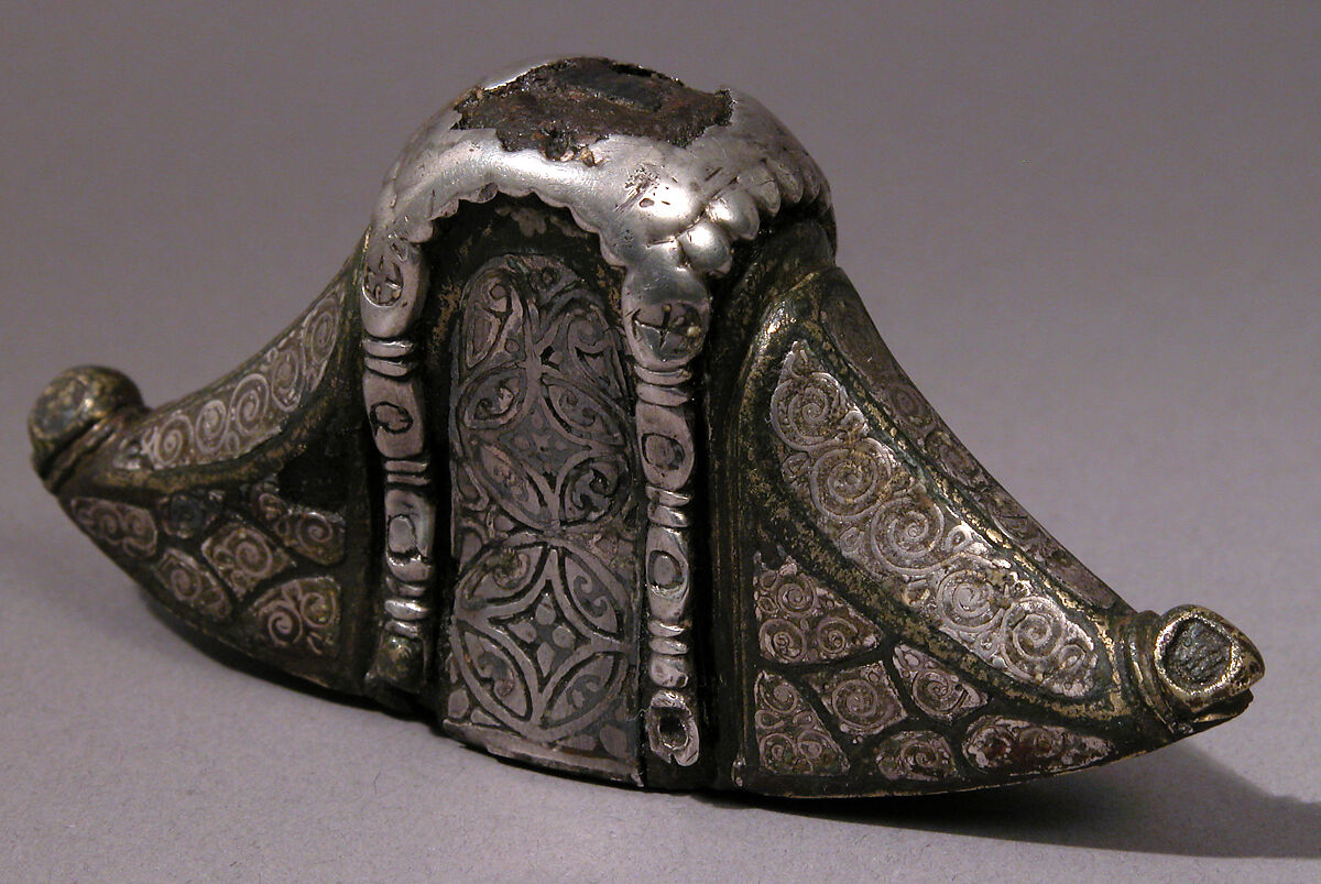 Sword Pommel, Copper alloy inlaid with silver wire and niello on
an iron core, Anglo-Saxon