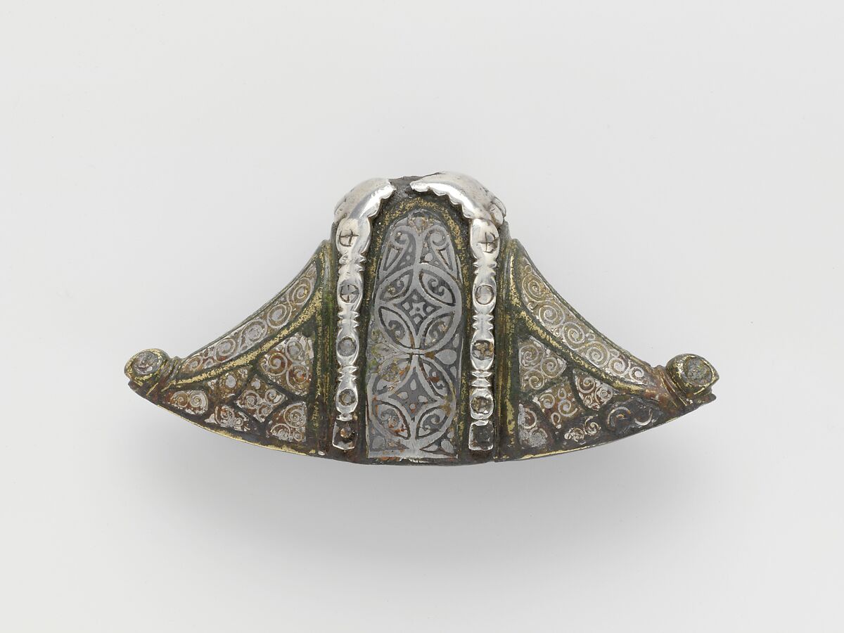 Sword Pommel, Copper alloy inlaid with silver wire and niello on
an iron core, Anglo-Saxon 