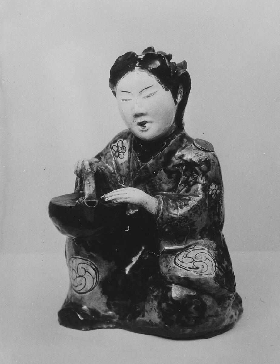 Figure of Girl with Wine-Kettle, Pottery decorated with enamels (Hizen ware, Kutani type), Japan 