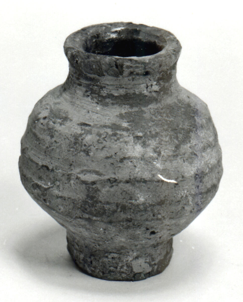 Pot, Earthenware, slip decoration, glazed interior, Roman