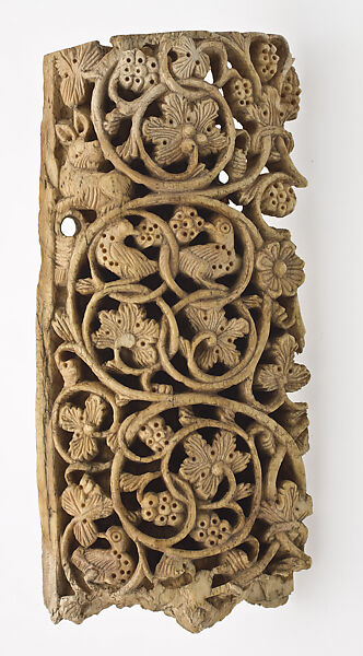 Plaque Decorated with Vine Scroll, Birds, and a Rabbit, Carved ivory 