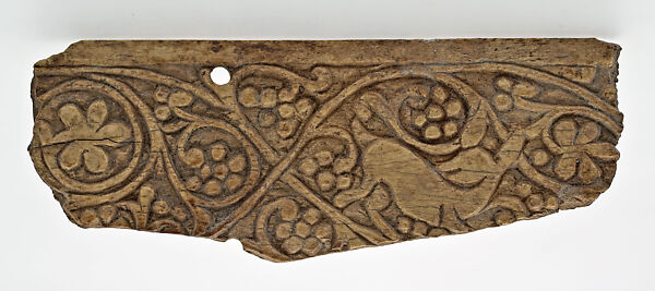 Plaque Decorated with Stylized Vine Scroll and a Deer, Carved bone 