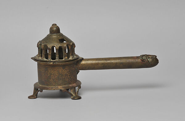 Censer with a Ram’s Head Handle, Cast copper alloy, engraved and punched 