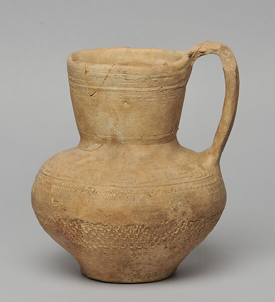 Jug from Dayr 'Ayn 'Abata, Cream ware with roll-on stamp decoration 