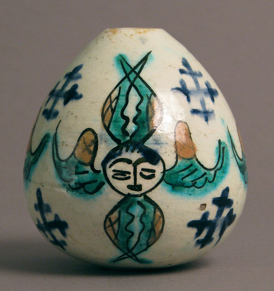 Egg-Shaped Ornament, Frit body with green, yellow, blue and brownish black underglaze painting, Armenian