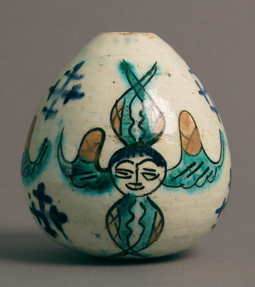 Egg-Shaped Ornament, Frit body with green, yellow, blue and brownish black underglaze painting, Armenian