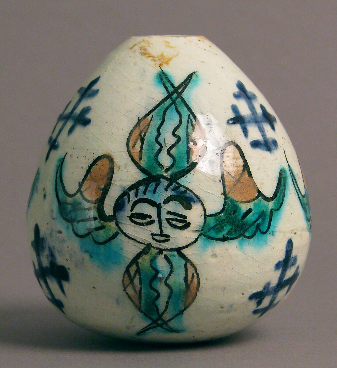 Egg-Shaped Ornament, Frit body with green, yellow, blue and brownish black underglaze painting, Armenian