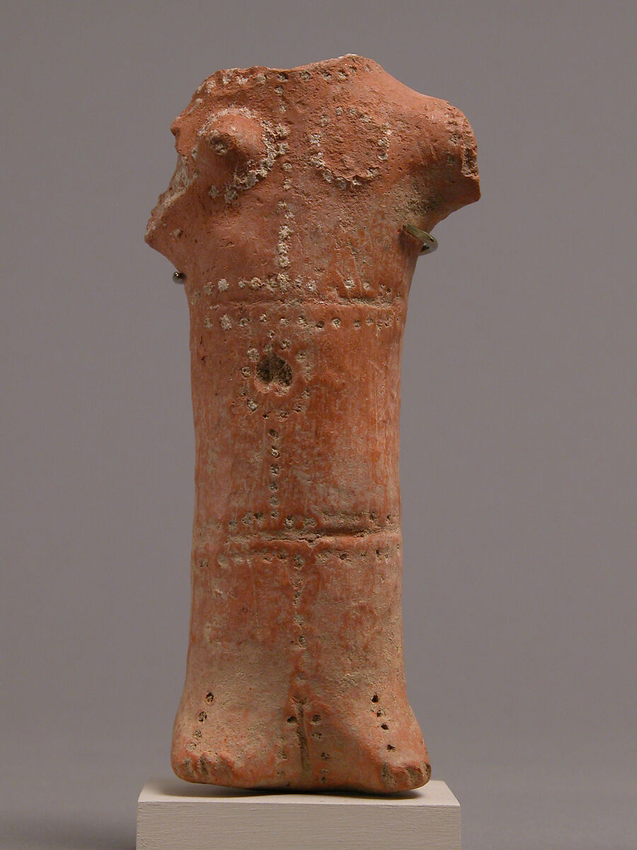 Fragment of a Female Figure, Earthenware, pierced decoration, Coptic 
