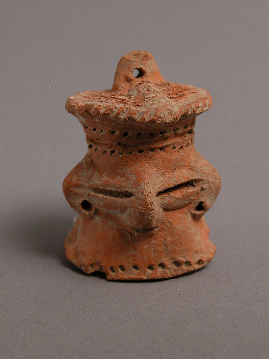 Head of a Female Figurine, Earthenware, pierced and slashed decoration, Coptic 