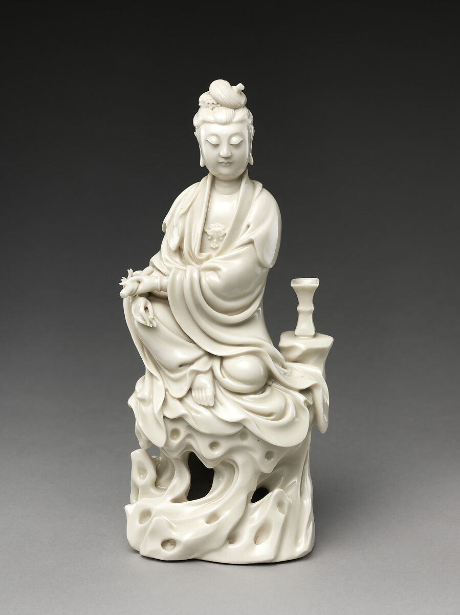 Bodhisattva Guanyin seated on a rock, Porcelain with ivory glaze (Dehua ware), China 