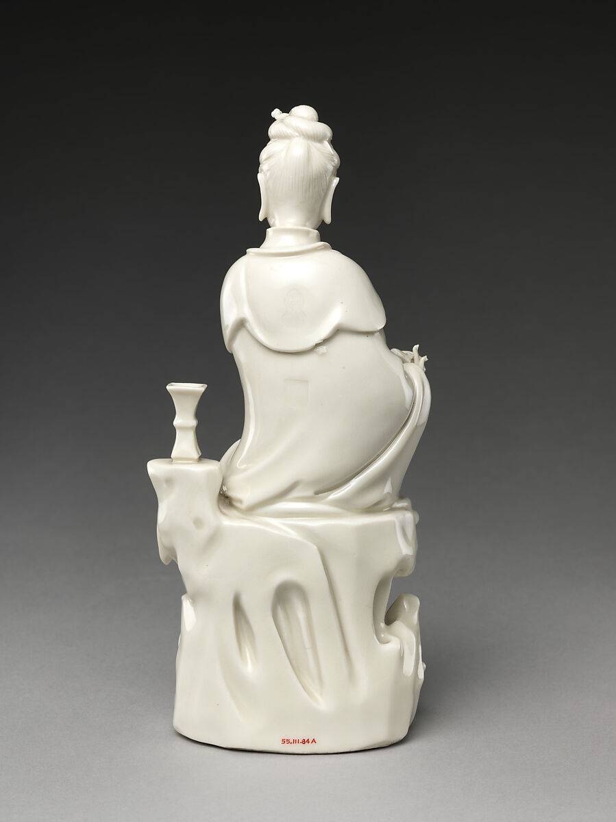 Bodhisattva Guanyin seated on a rock, Porcelain with ivory glaze (Dehua ware), China