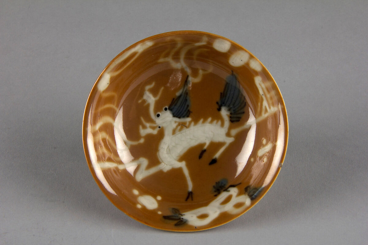 Dish with mythical beast qilin (one of a pair), Porcelain with white slip decoration and brown glaze (Jingdezhen ware), China 