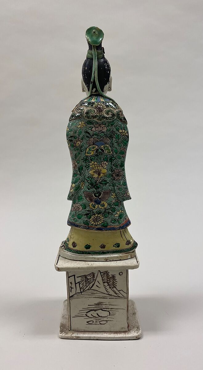 Figure of a fairy holding a peach, Porcelain painted in polychrome enamels on the biscuit (Jingdezhen ware), China