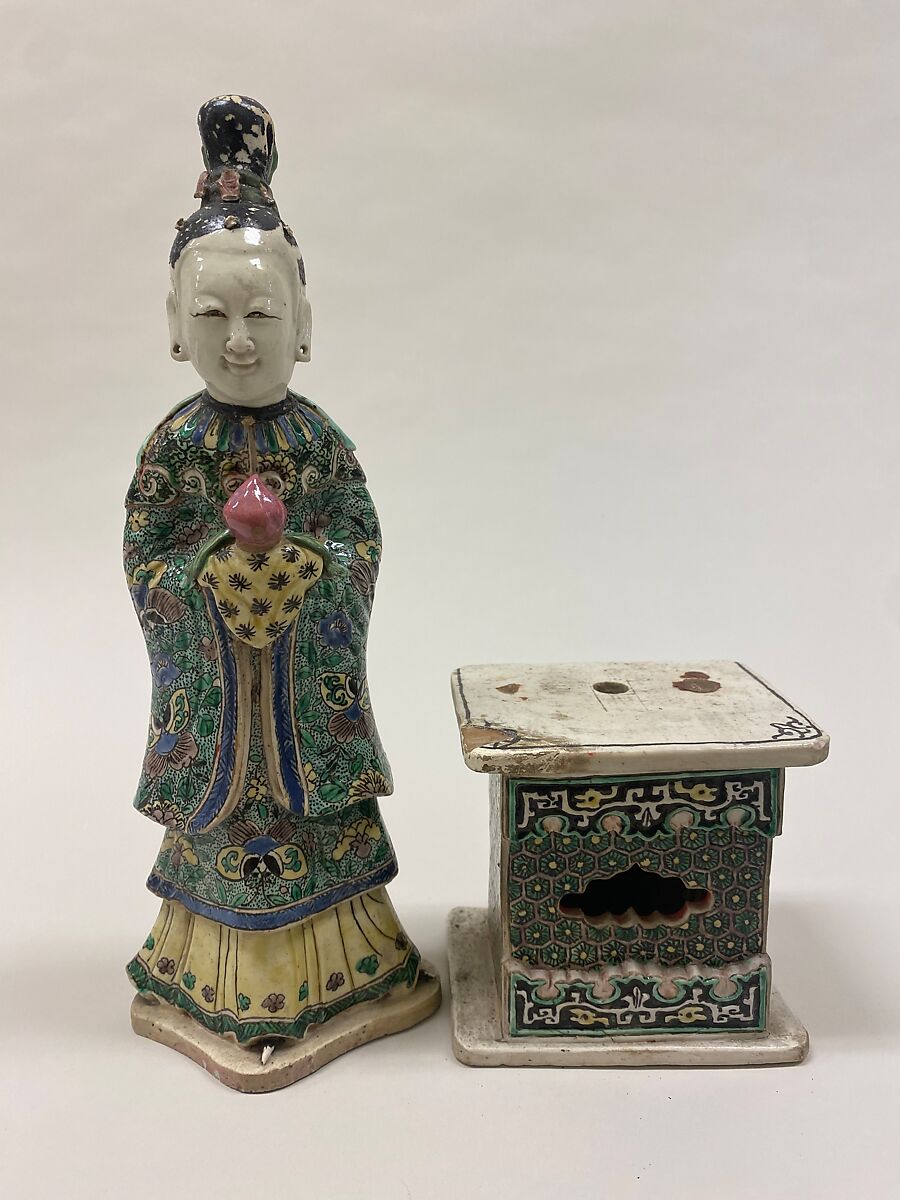 Figure of a fairy holding a peach, Porcelain painted in polychrome enamels on the biscuit (Jingdezhen ware), China