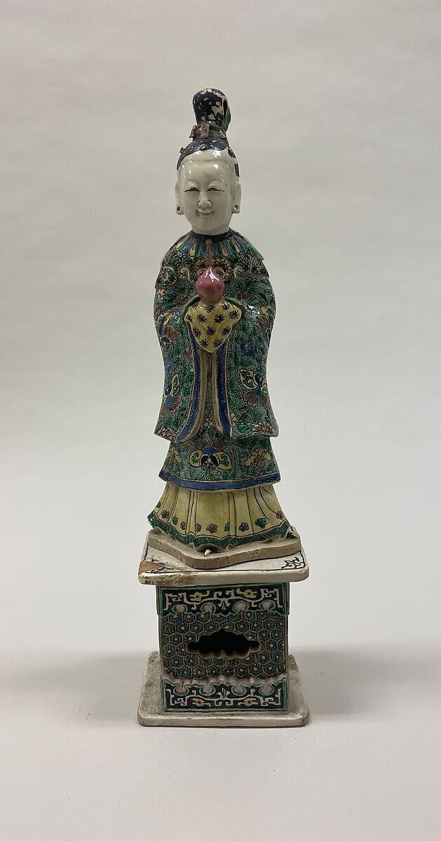 Figure of a fairy holding a peach, Porcelain painted in polychrome enamels on the biscuit (Jingdezhen ware), China 