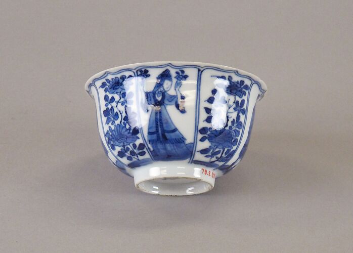 Cup with women and flowers