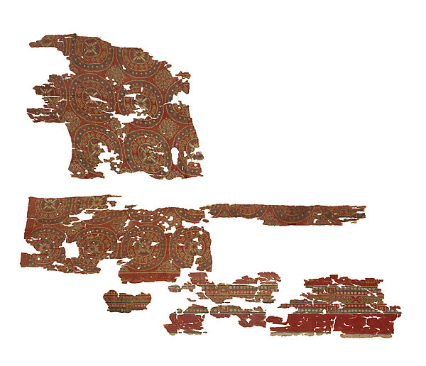 Three Fragments of a Tiraz Inscribed with the Name of the Caliph Marwan, Weft-faced compound twill weave (samit) in polychrome silk; inscription embroidered in yellow silk in Ifriqiya (modern Tunisia) 