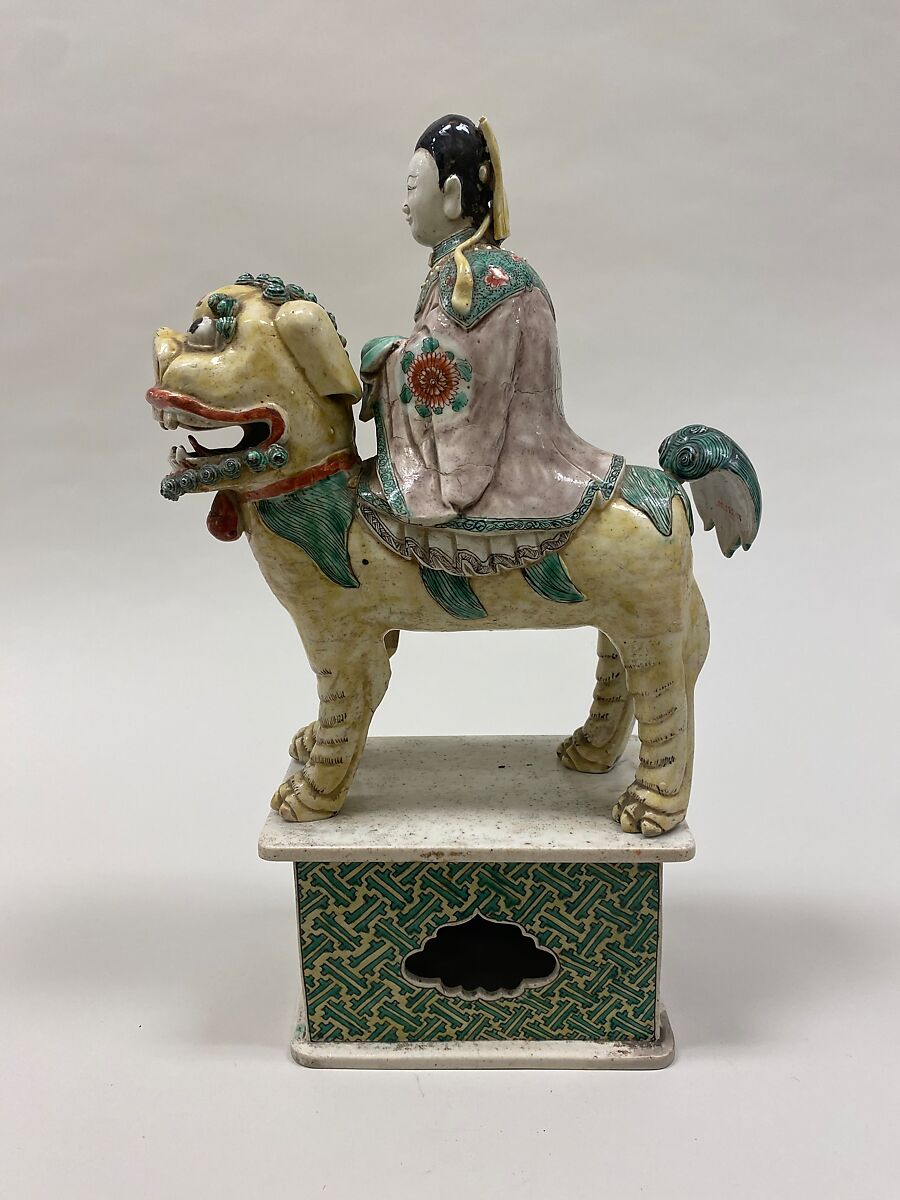 Figure of Bodhisattva Guanyin riding a lion, Porcelain painted in polychrome enamels over the biscuit (Jingdezhen ware), China 