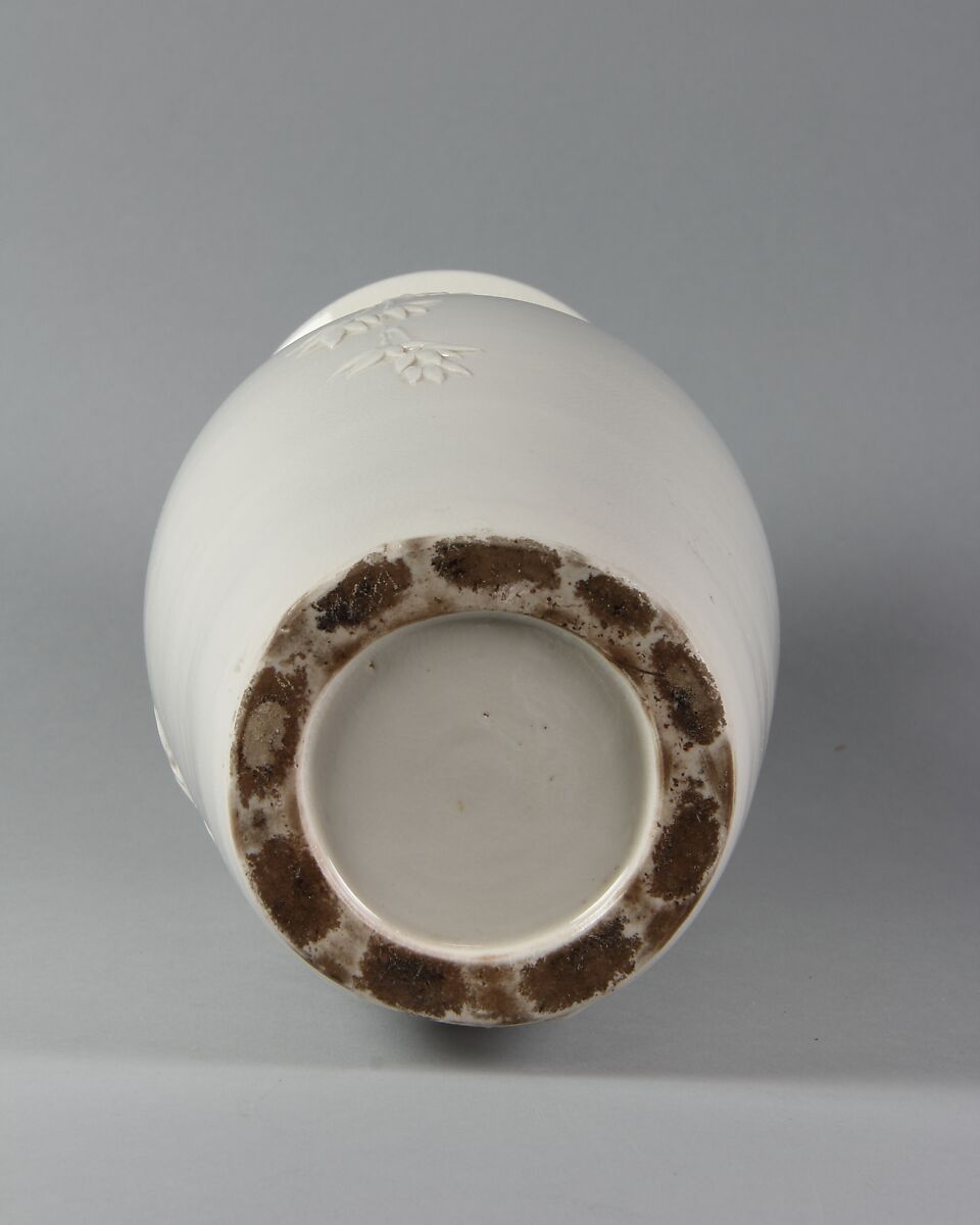 Vase with plum blossom and bamboo, Porcelain with relief decoration (Jingdezhen ware), China