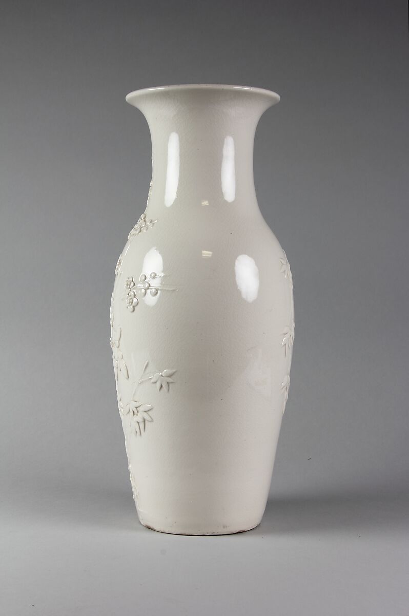 Vase with plum blossom and bamboo, Porcelain with relief decoration (Jingdezhen ware), China