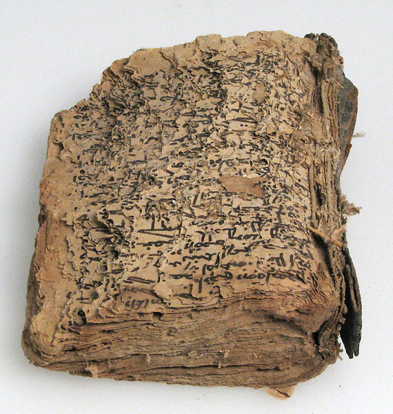 Remains of a Manuscript, Ink on paper; leather binding, Syriac
