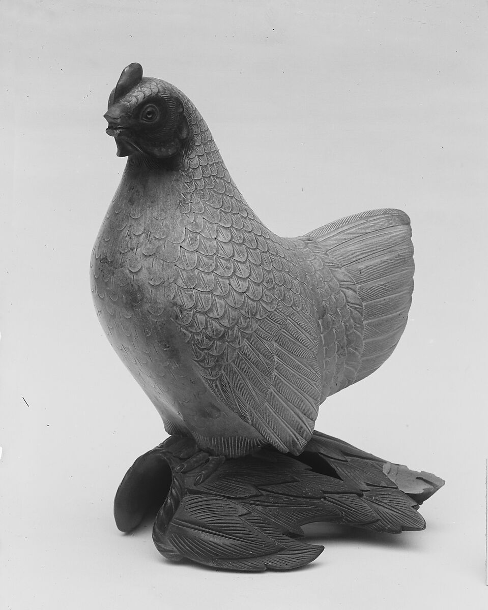 Ornament, Clay, the base in darker clay with a thin glaze, Japan 