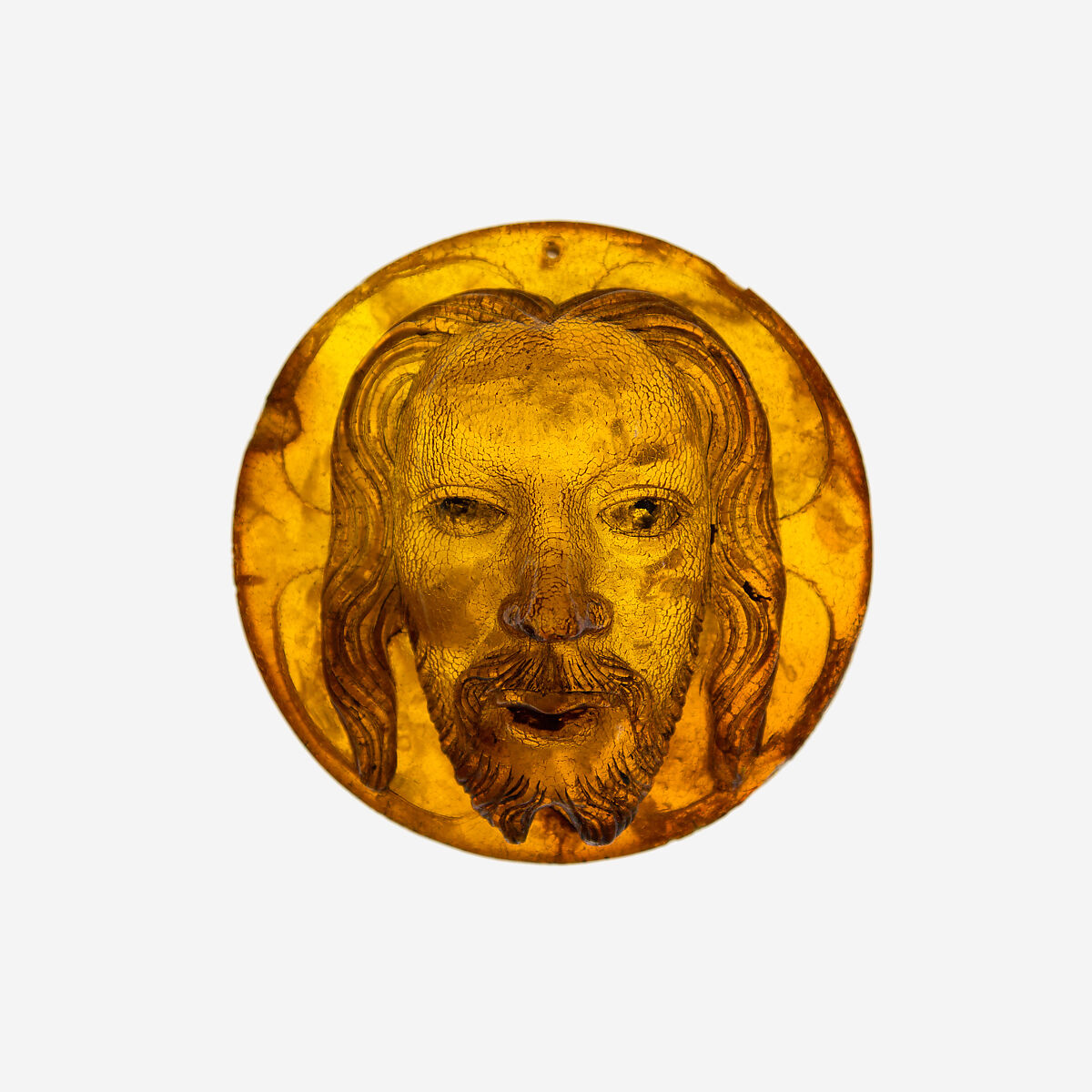 Medallion with the Face of Christ, Baltic amber with traces of paint, Polish