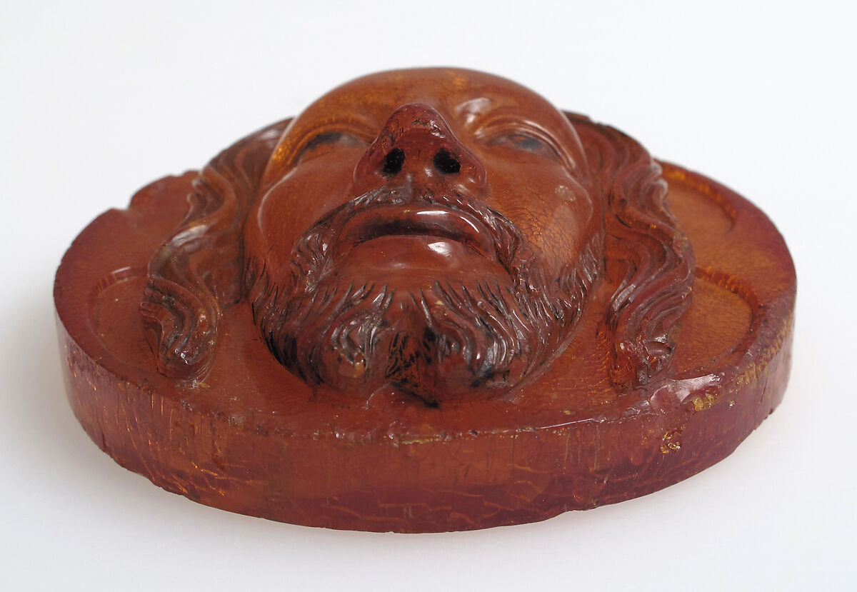 Medallion with the Face of Christ, Baltic amber with traces of paint, Polish