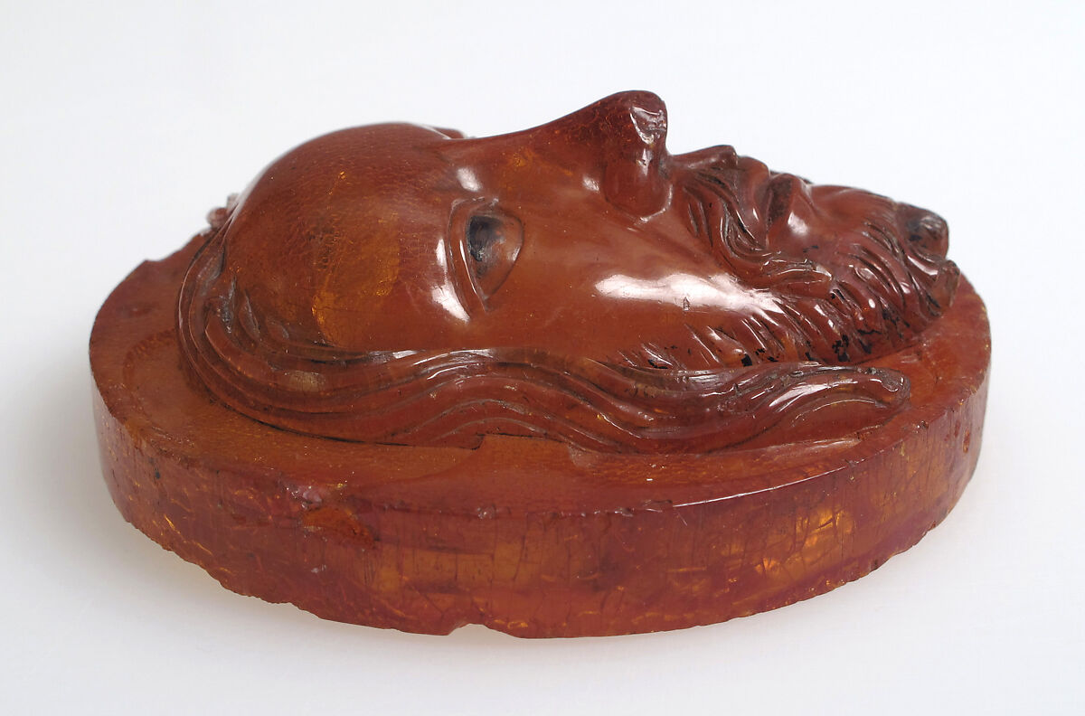 Medallion with the Face of Christ, Baltic amber with traces of paint, Polish