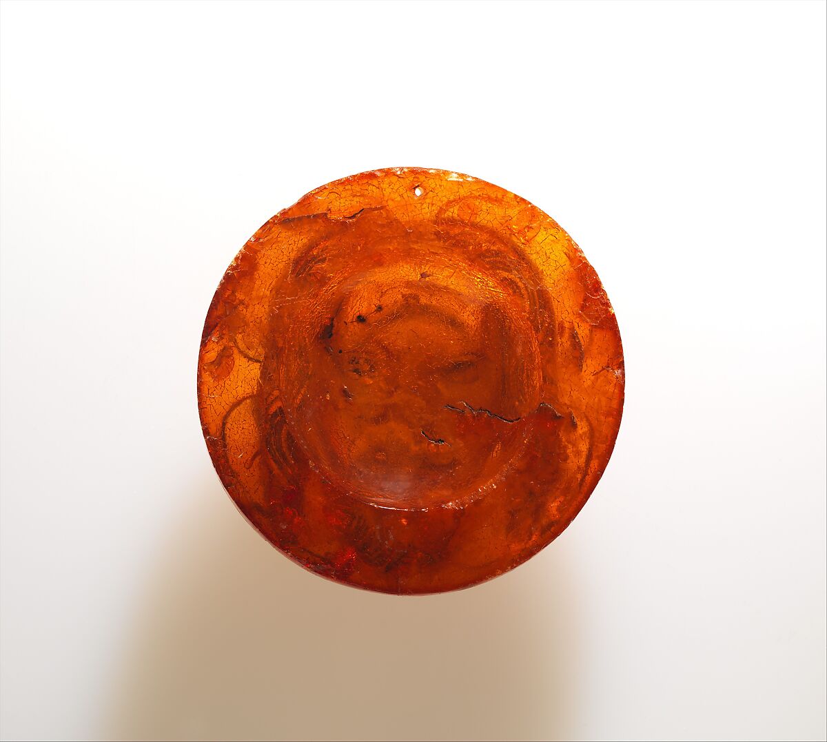 Medallion with the Face of Christ, Baltic amber with traces of paint, Polish