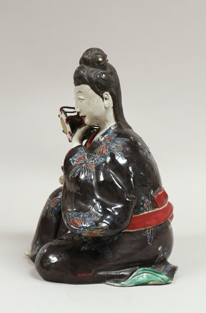 Figure of Girl playing Tsuzumi, Porcelain decorated with colored enamels (Hizen ware, Kutani type), Japan