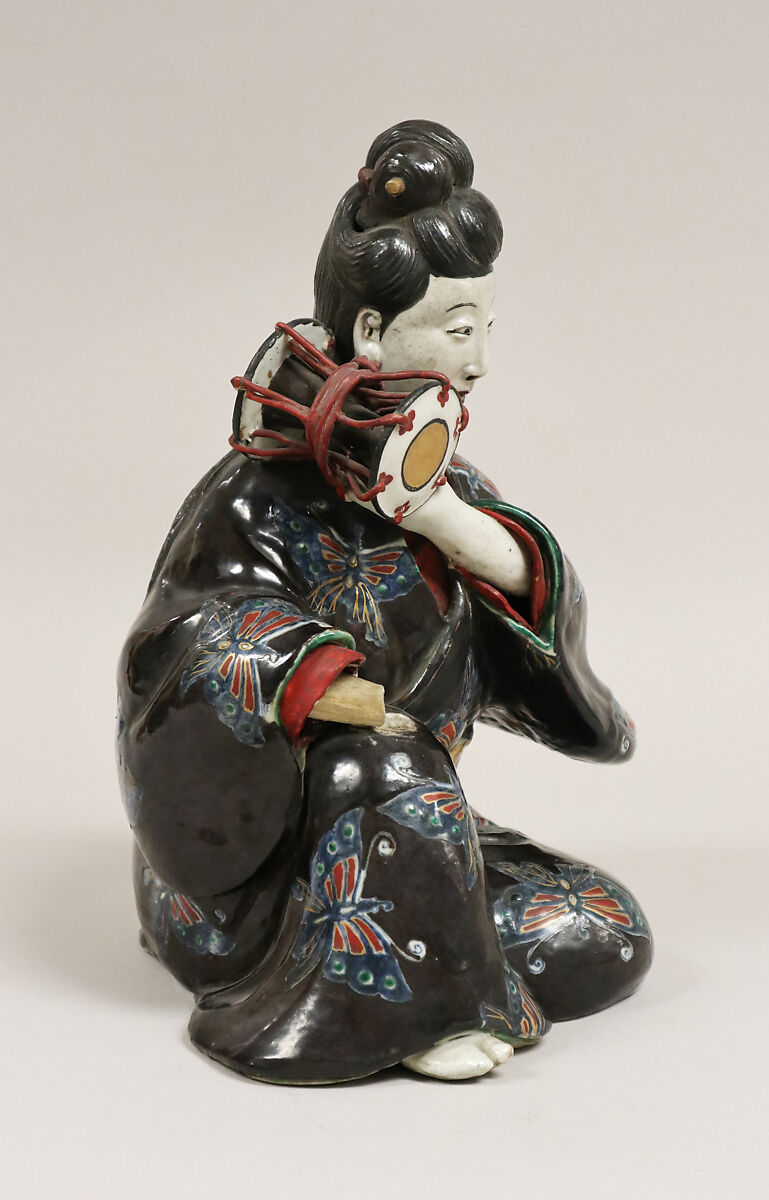 Figure of Girl playing Tsuzumi, Porcelain decorated with colored enamels (Hizen ware, Kutani type), Japan