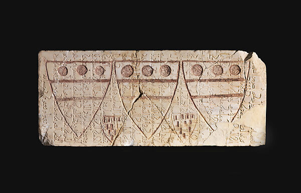 Three Coats of Arms of Sir Hugh Wake over a Royal Fatimid Inscription