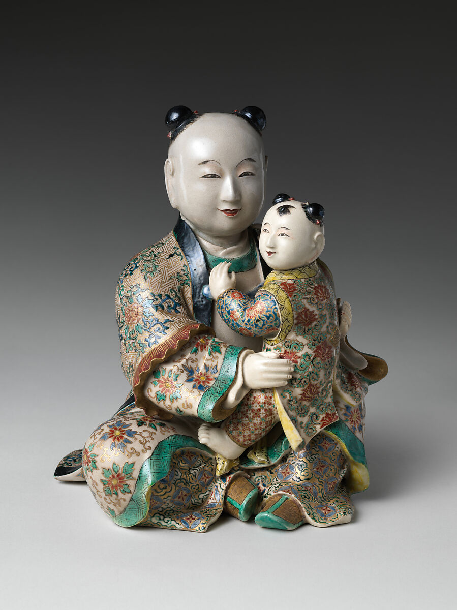 Seated Karako (Chinese boy) with a Child, Stoneware with polychrome enamels and gold over finely crackled glaze (Satsuma ware), Japan 