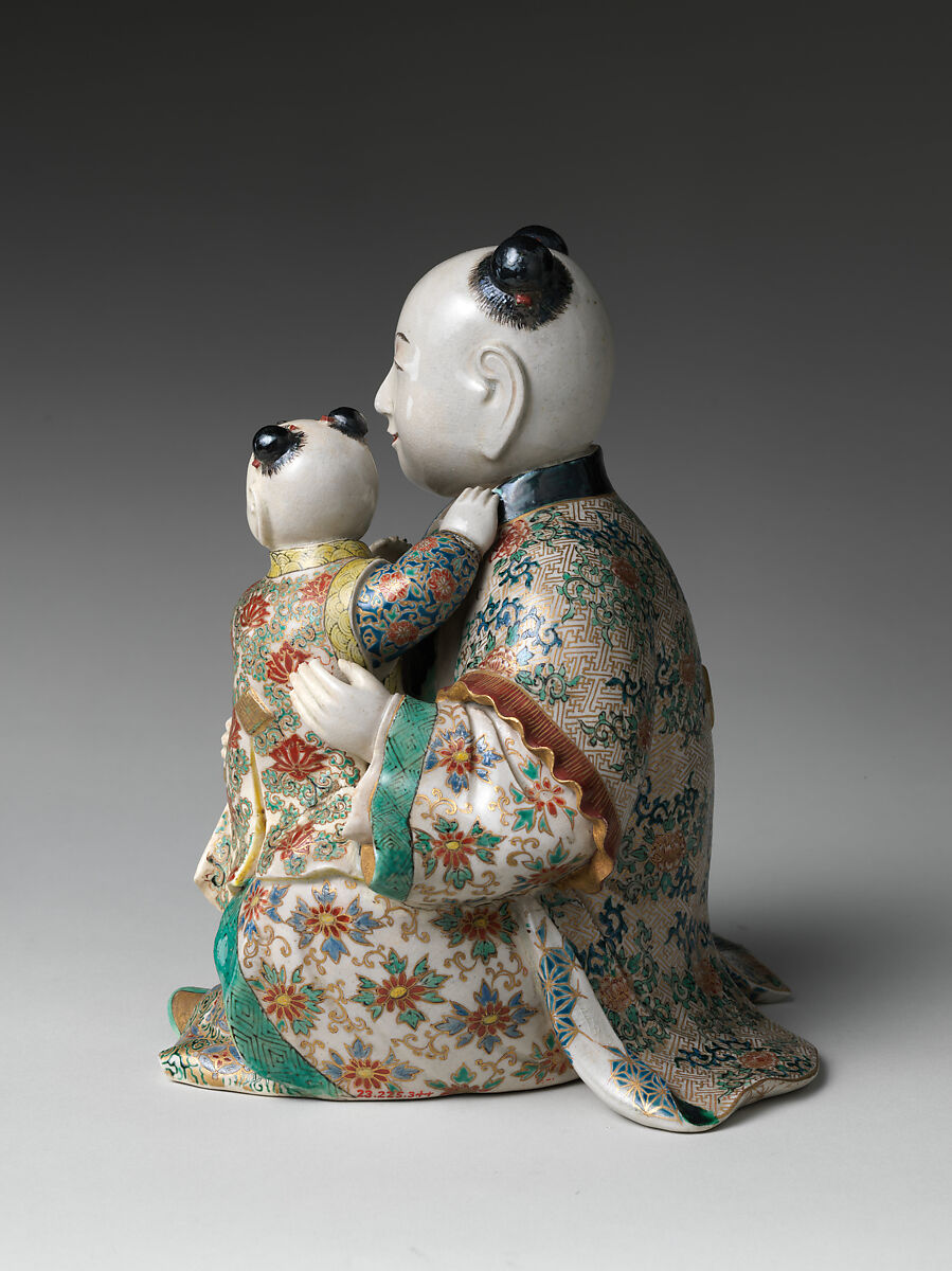 Seated Karako (Chinese boy) with a Child, Stoneware with polychrome enamels and gold over finely crackled glaze (Satsuma ware), Japan