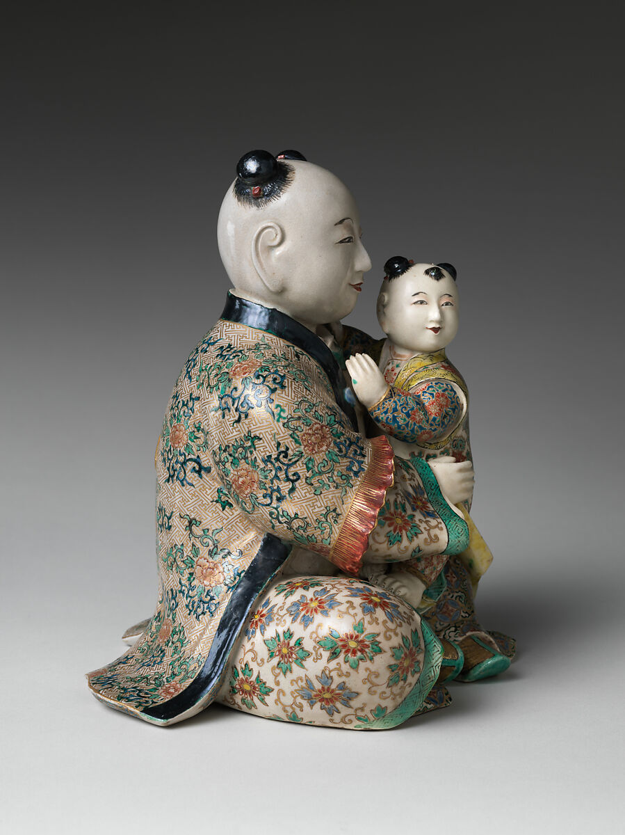 Seated Karako (Chinese boy) with a Child, Stoneware with polychrome enamels and gold over finely crackled glaze (Satsuma ware), Japan