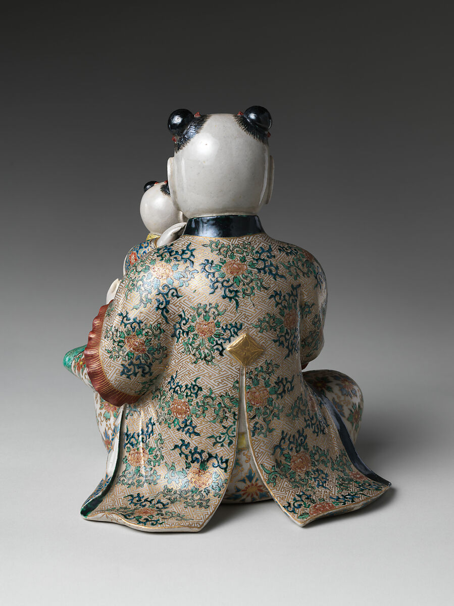 Seated Karako (Chinese boy) with a Child, Stoneware with polychrome enamels and gold over finely crackled glaze (Satsuma ware), Japan