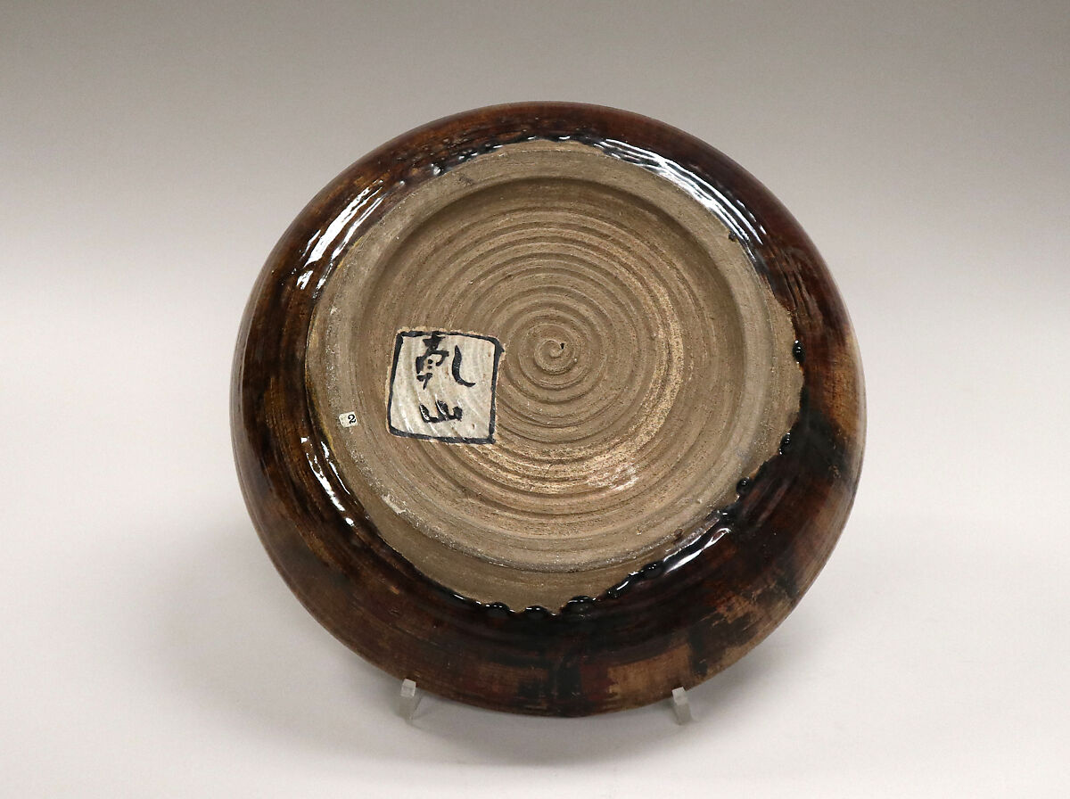 Bowl with Face of Uzume, Kenzan IV (Japanese,) (?), Modeled in relief and covered with a crackled glaze (Tokyo ware, Kenzan style), Japan