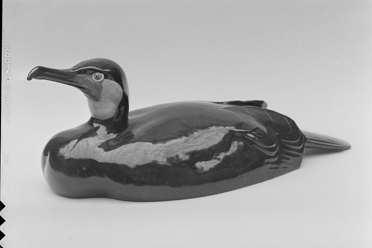 Figure of Cormorant, Tennozan Kawashima, Pottery; natural-colored body with black glaze overall; throat buff, speckled towards beak; beak, brown; eyes, yellow-gray; underside natural color with clear glaze, Japan 