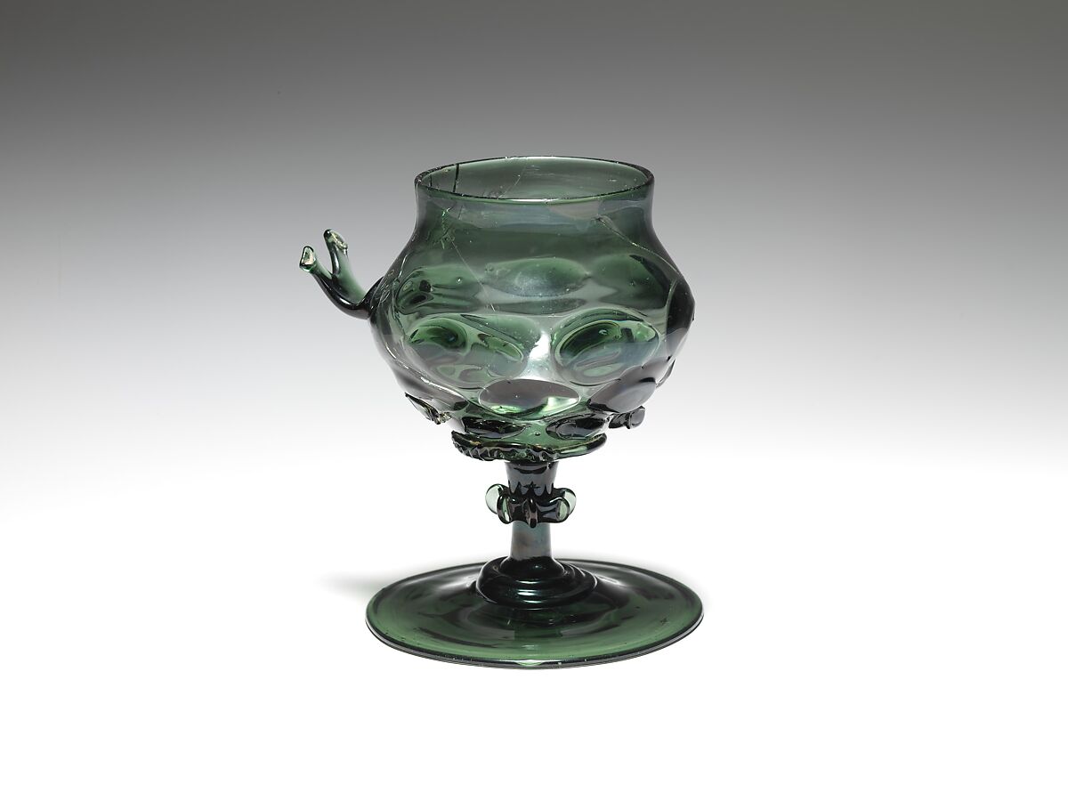 Footed Cup with handle: Scheuer, Free-blown glass with applied decoration, German 